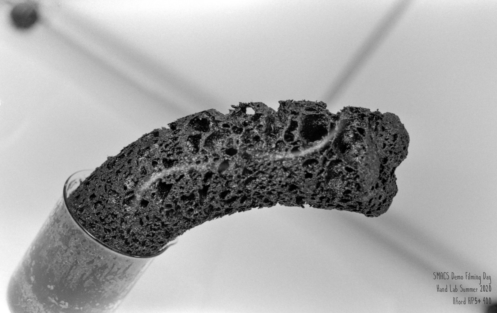 Carbon column from the dehydration of sugar with concentrated sulfuric acid.